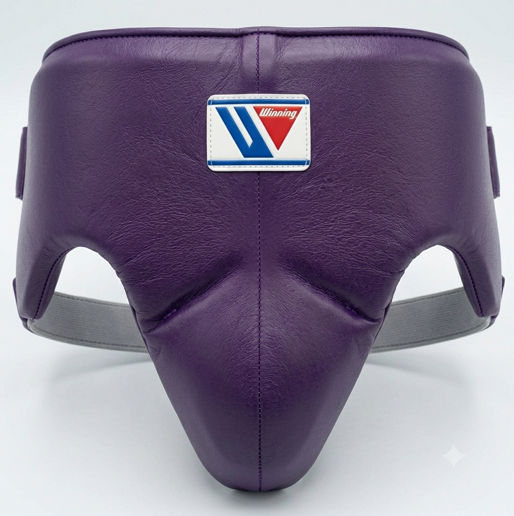 A purple leather boxing headguard with a white, blue, and red 'Winding' brand patch on the forehead, set against a plain light gray background.