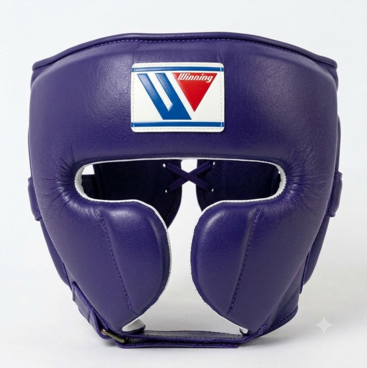 Winning FG-2900 Classic Purple boxing headgear with brand logo patch on forehead