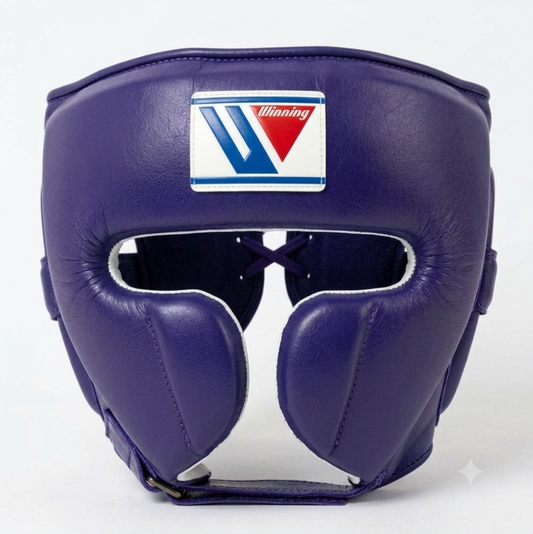 Winning FG-2900 Classic Purple boxing headgear with brand logo patch on forehead