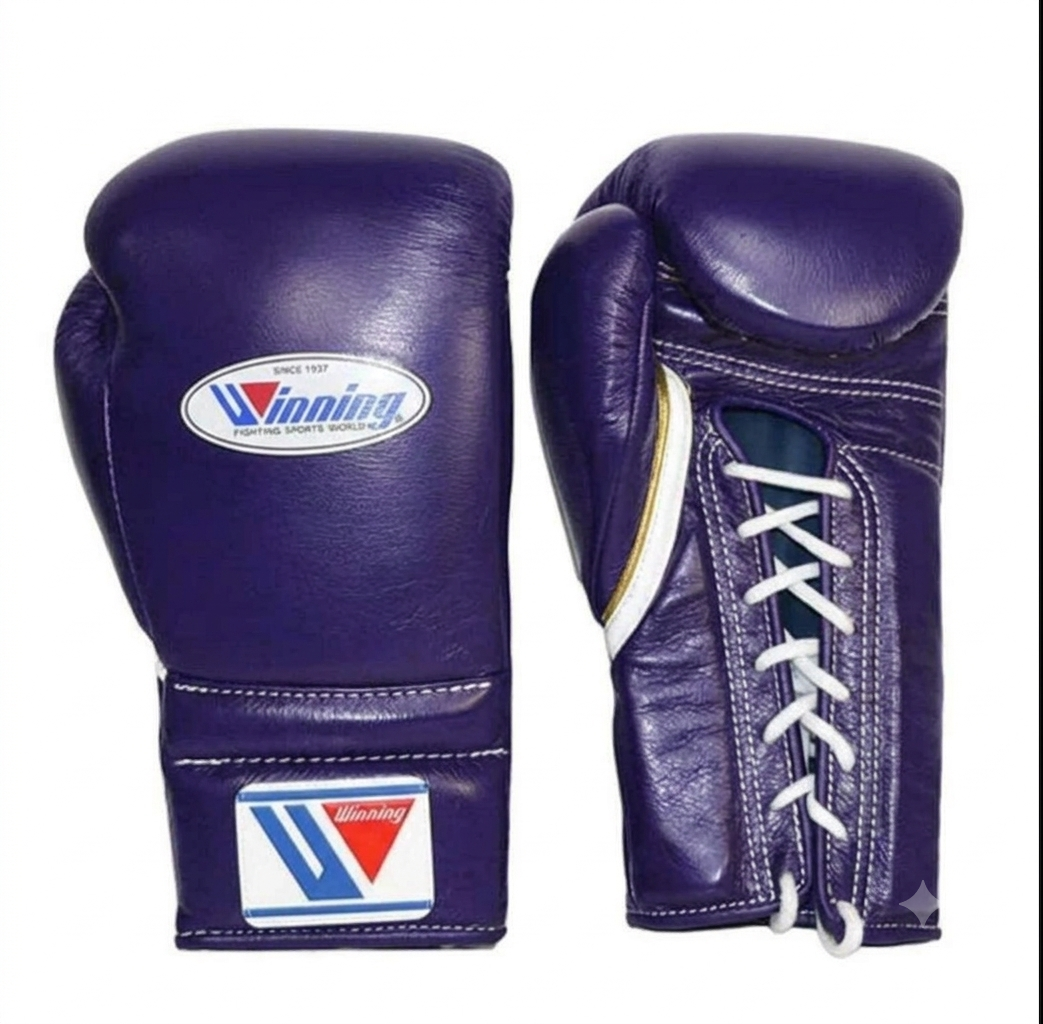 A pair of purple leather boxing gloves shown against a plain white background, displaying both the front and side/lace-up views. The brand logo 'Winning' is visible on the front and wrist strap.