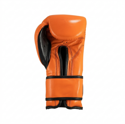 Cleto Reyes orange leather boxing glove with black trim and black wrist strap side view