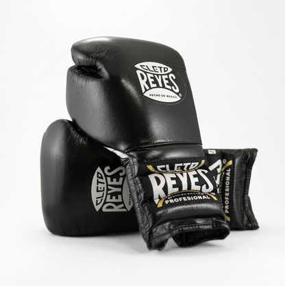 Cleto Reyes black boxing gloves pair with white and gold branding