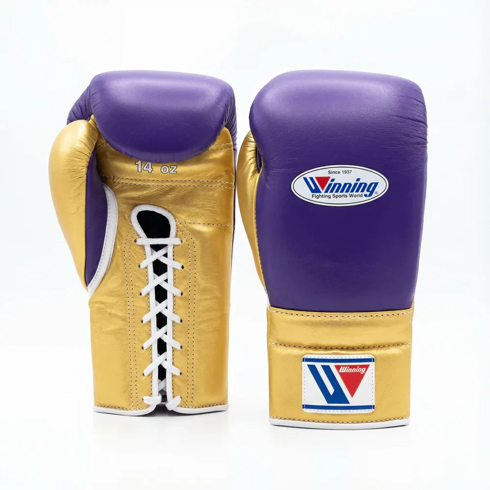 Custom Winning professional lace-up boxing gloves in royal purple leather featuring a metallic gold thumb, metallic gold cuff area, and white official brand patches.