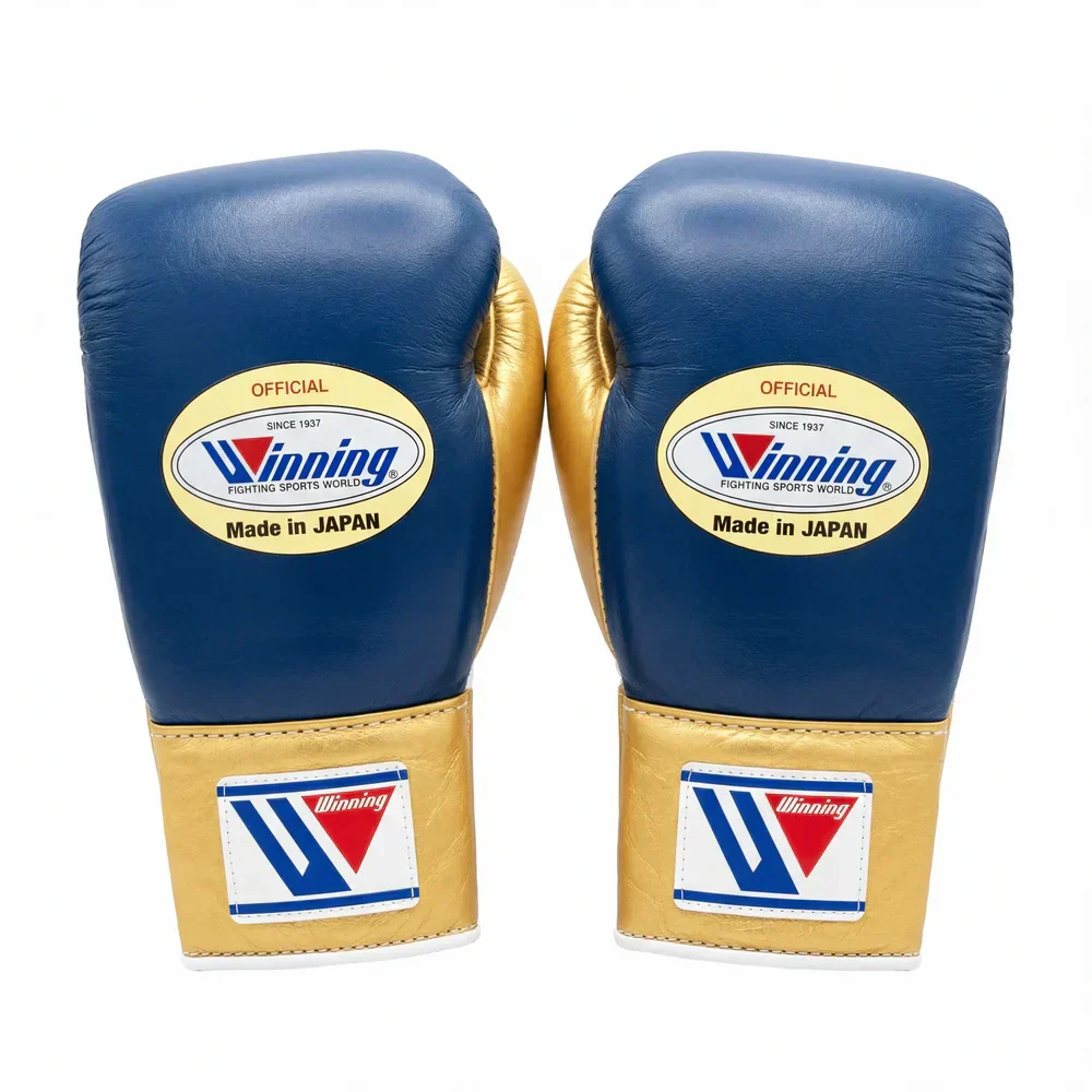 Authentic navy blue and metallic gold Winning professional boxing gloves handcrafted in Japan with official branding.