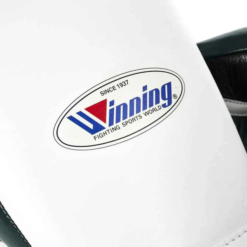 Authentic White and Black Winning MS-500 professional lace-up boxing gloves handcrafted in Japan with premium leather.