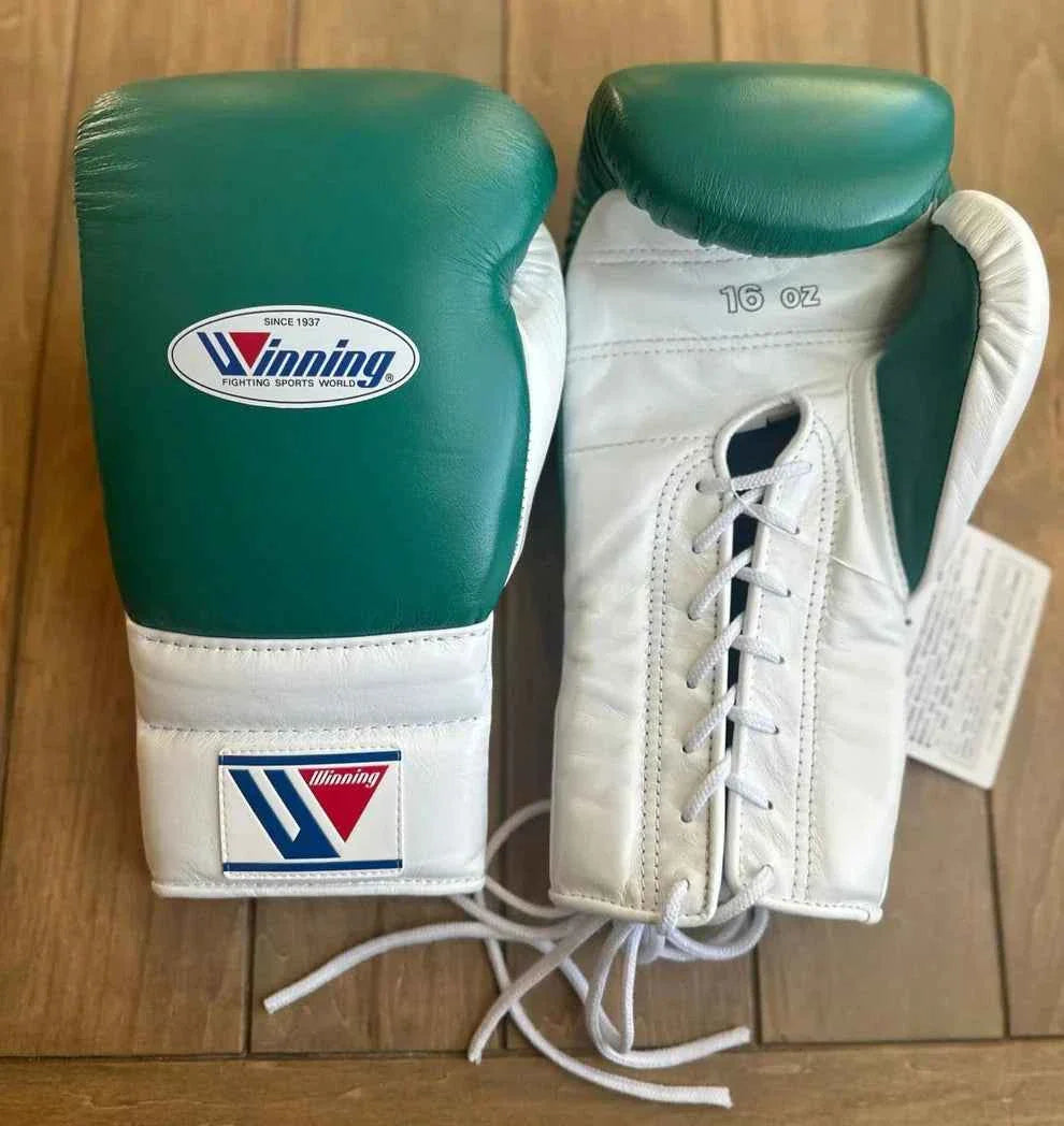 Authentic Winning MS-600 professional lace-up boxing gloves in forest green and white premium leather.
