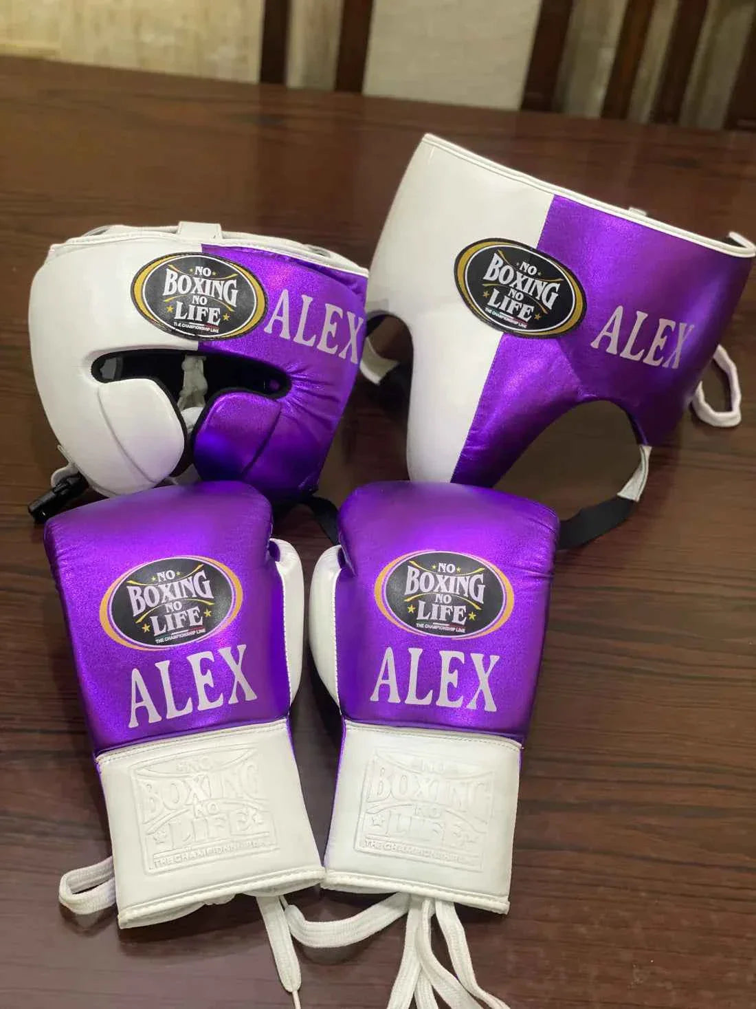 Authentic No Boxing No Life professional boxing set featuring metallic purple and white lace-up gloves, headgear, and groin guard.