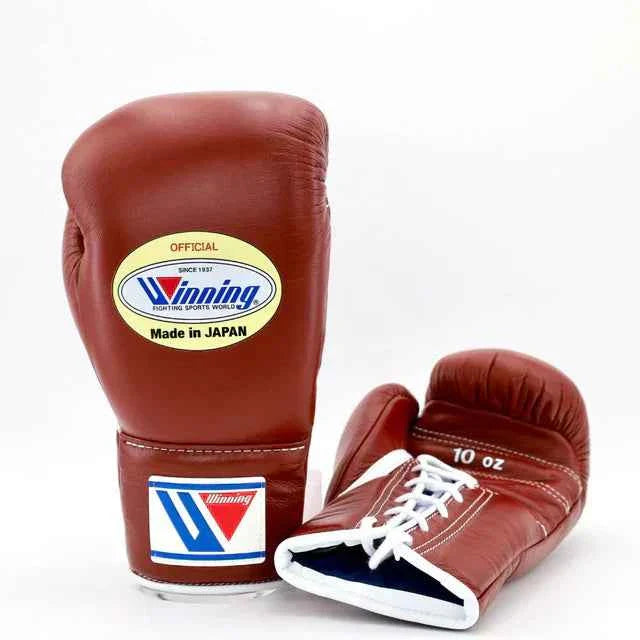 Authentic brown Winning MS-300 professional 10oz lace-up boxing gloves handcrafted in Japan with official logo.