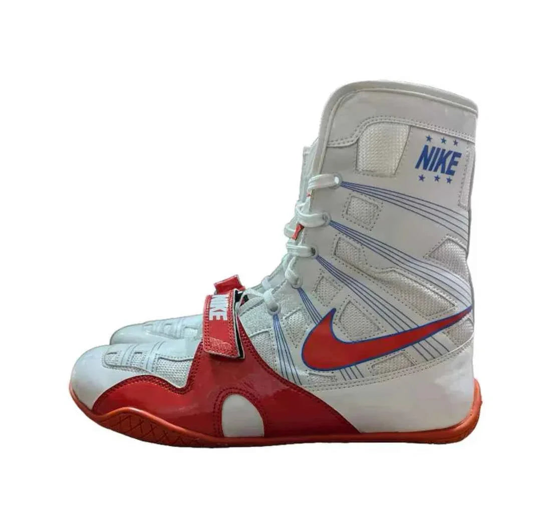 Professional Nike Hyperko 1 boxing boots in white and red featuring Flywire support and a forefoot lockdown strap.