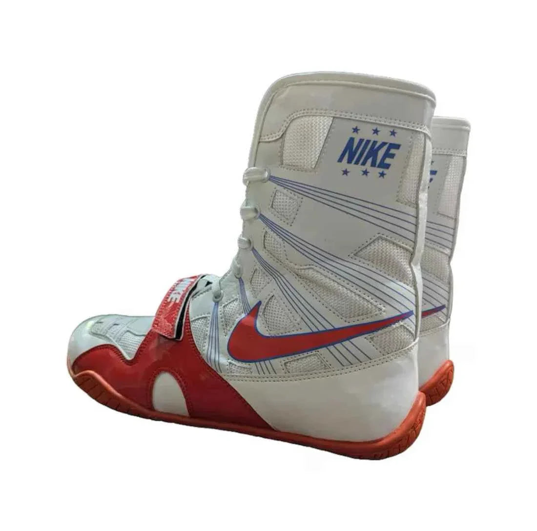 Professional Nike Hyperko 1 boxing boots in white and red featuring Flywire support and a forefoot lockdown strap.
