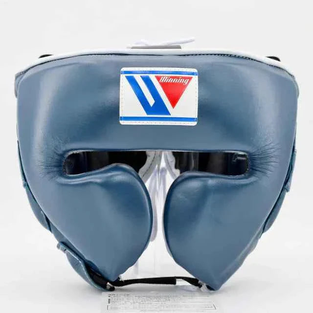 Authentic navy blue Winning FG-2900 professional boxing headgear with premium leather and lace-top closure.