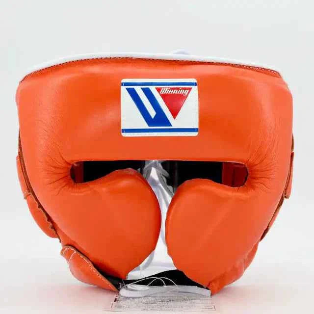 Authentic orange Winning FG-2900 professional boxing headgear with premium leather and lace-top closure.