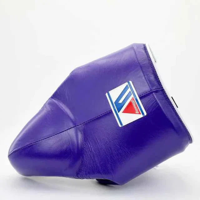 Authentic purple Winning CPS-500 professional boxing groin guard in premium leather with iconic brand logo.