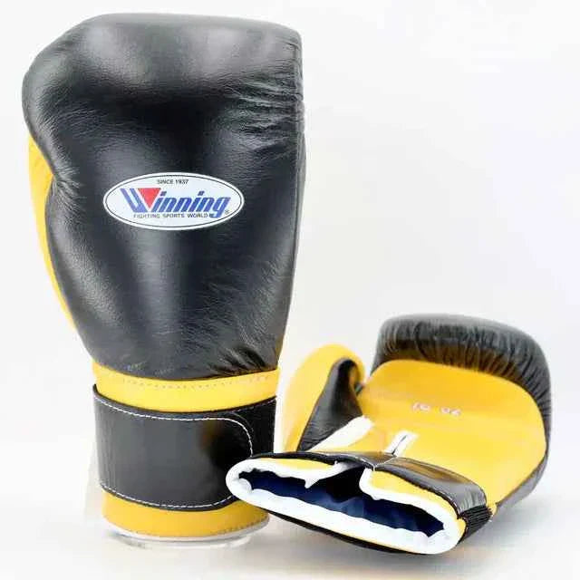 Authentic Winning MS-600-B professional velcro boxing gloves in black and yellow premium leather.