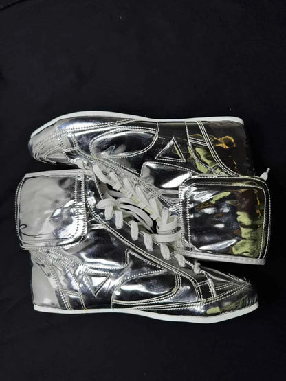Close-up of metallic silver custom boxing boot lacing and upper
