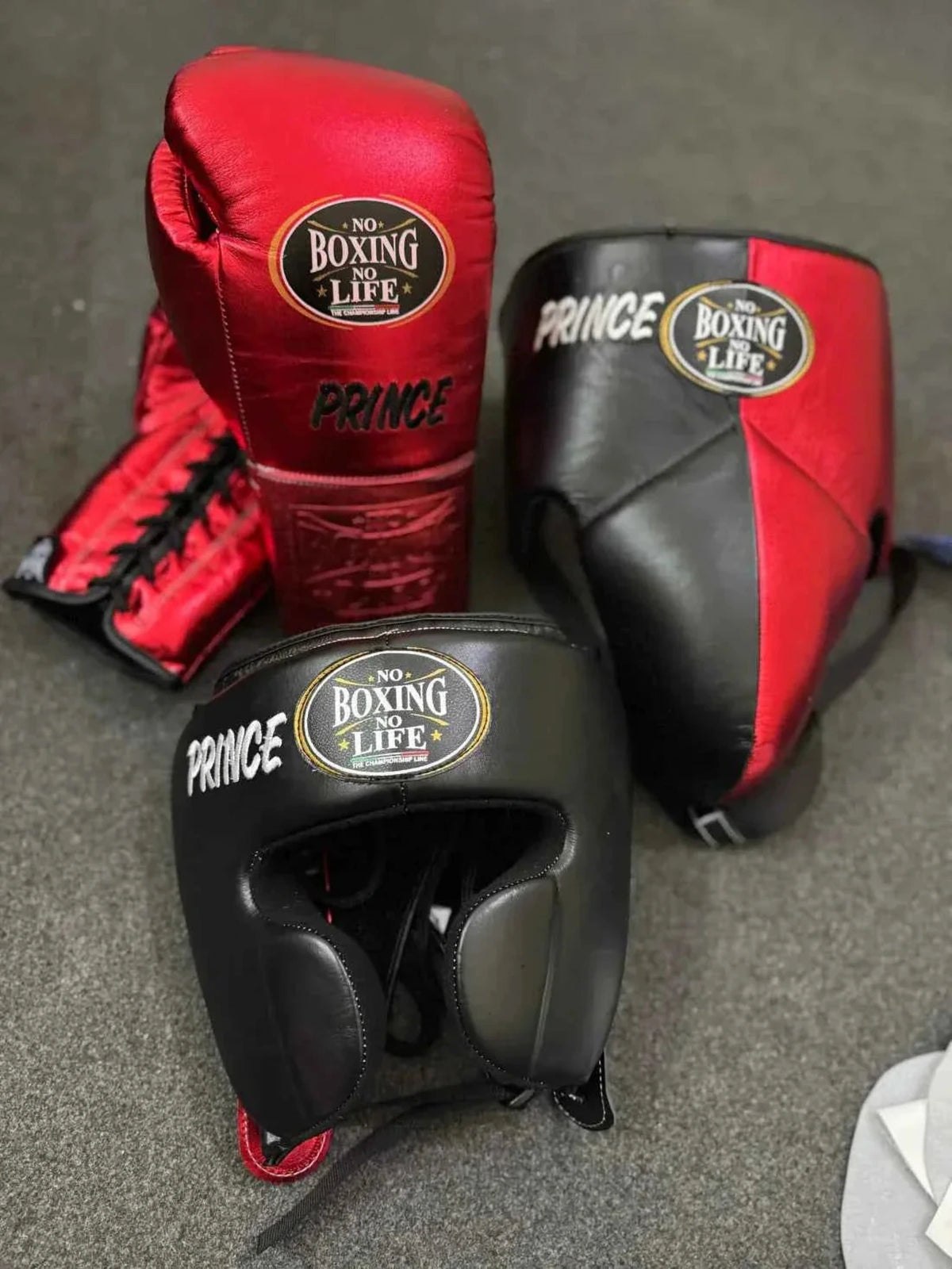 No Boxing No Life metallic red and black leather groin guard and headgear with brand branding