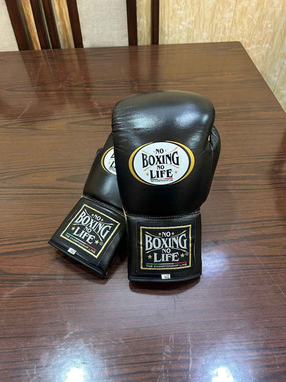 Black and gold lace-up training gloves side angle