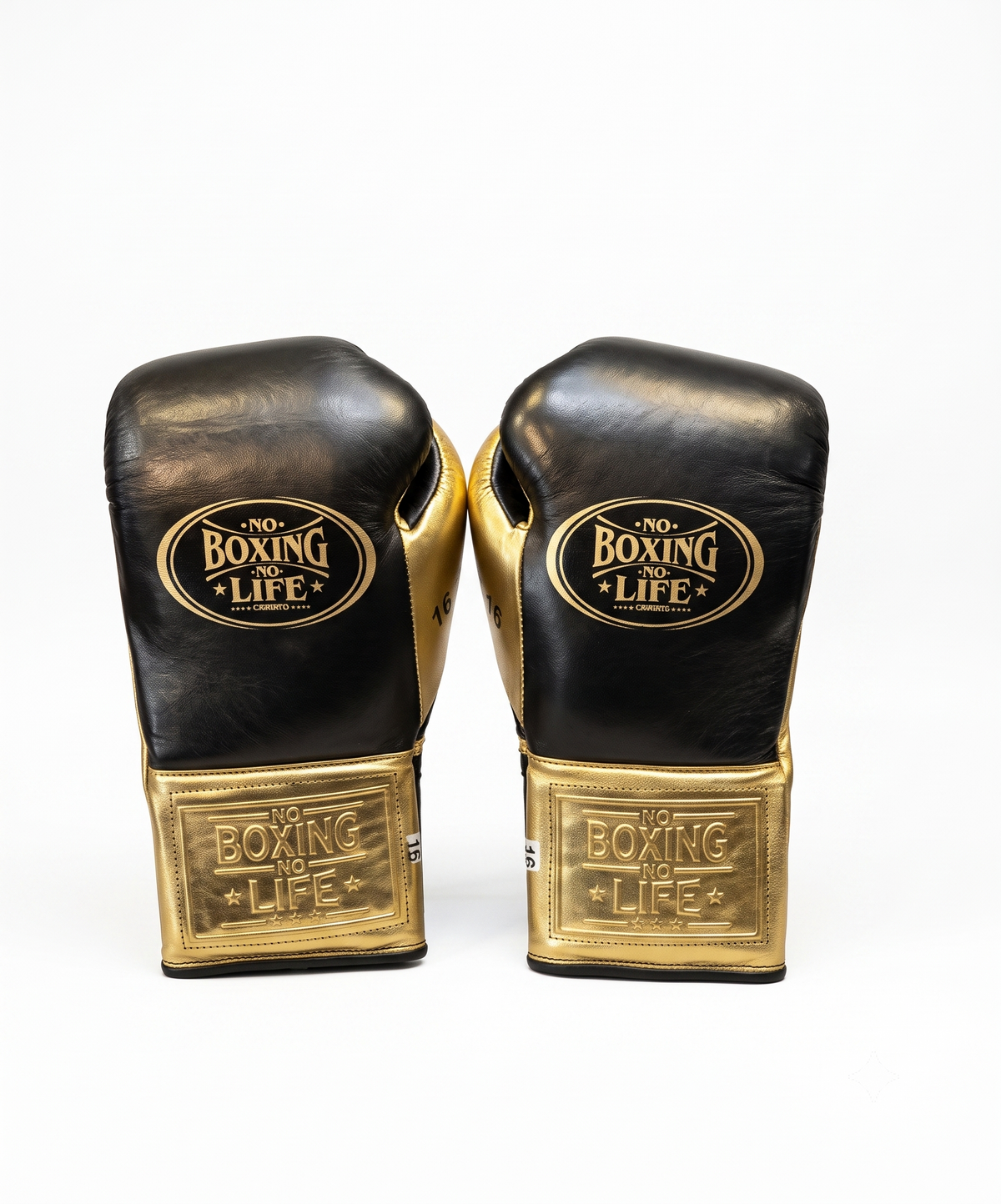 Black leather boxing gloves with full metallic gold cuff