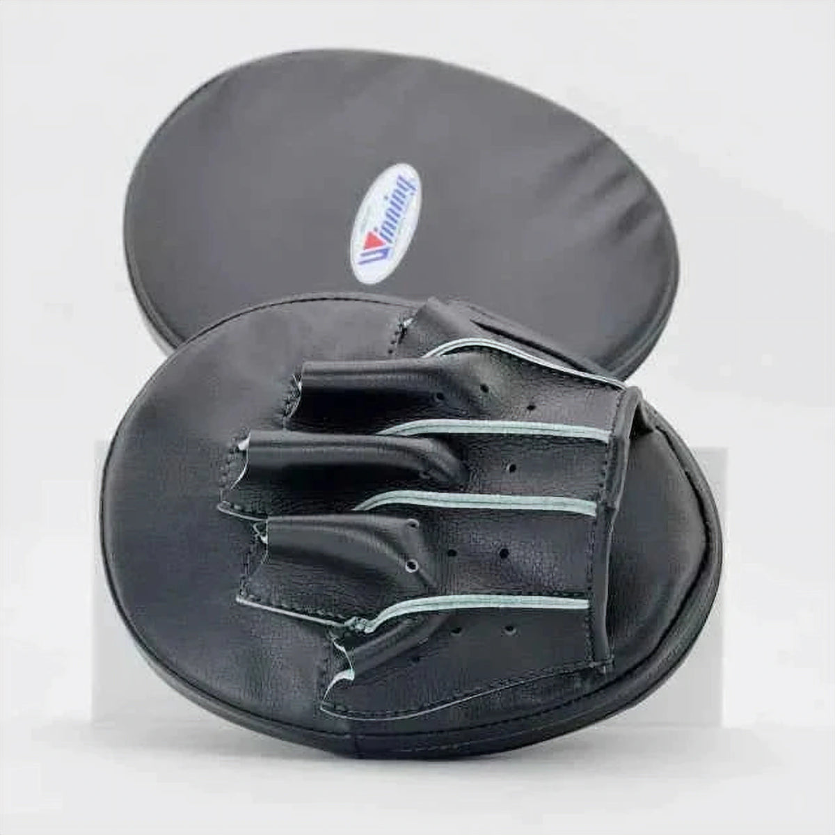 Winning CM-20 curved focus mitts in all black leather