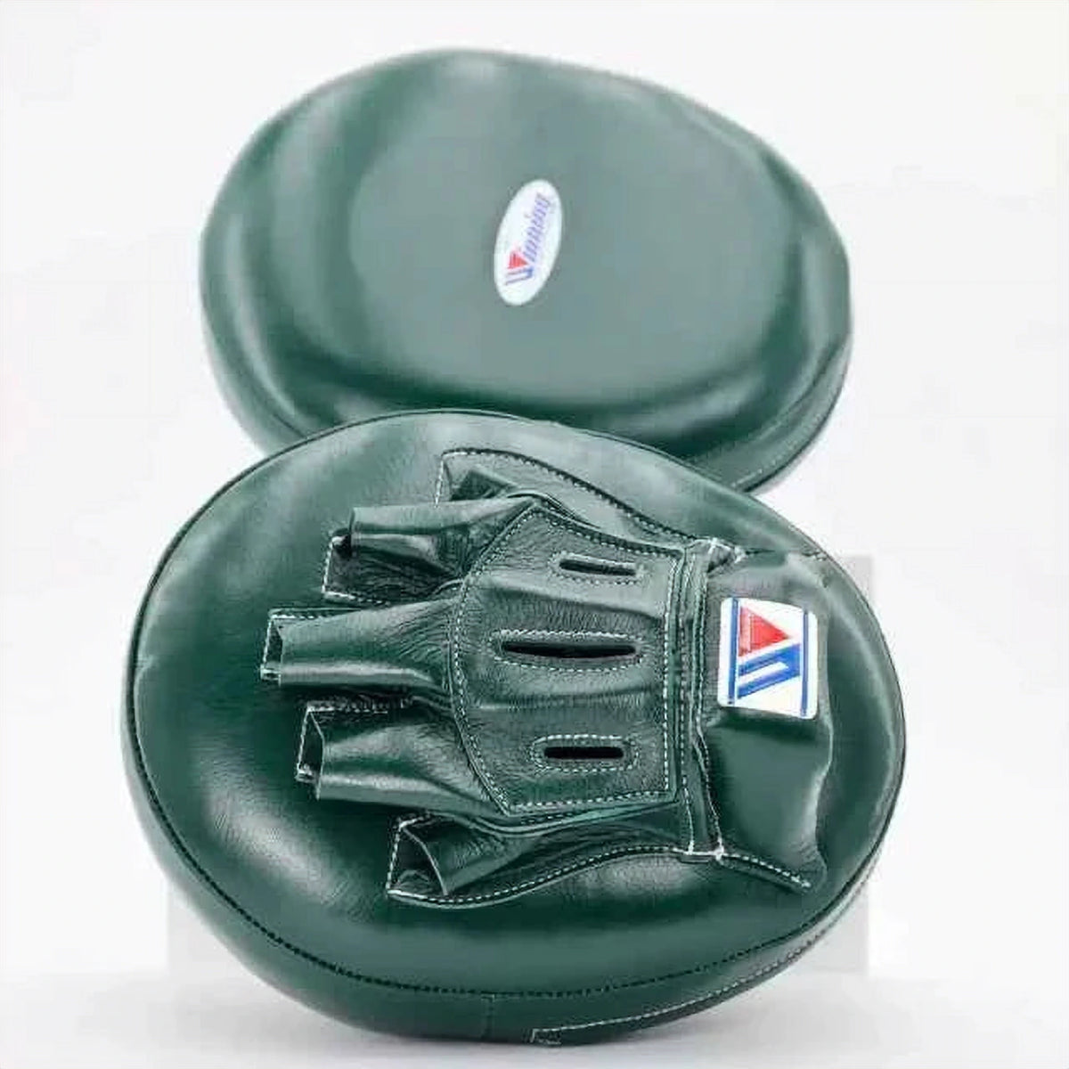 Winning CM-10 curved focus mitts in forest green leather