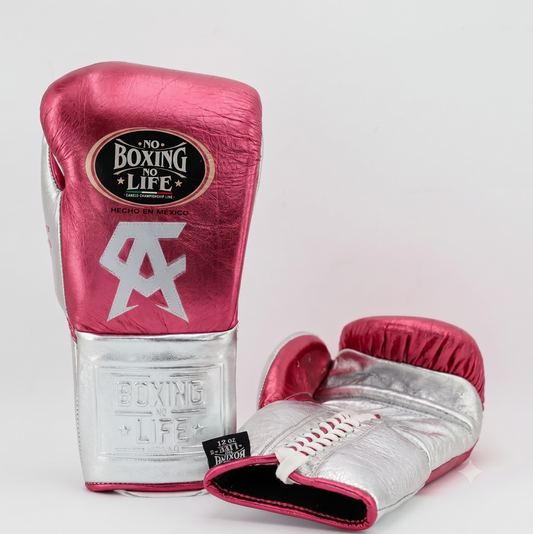 Metallic pink and silver leather boxing gloves pair front view