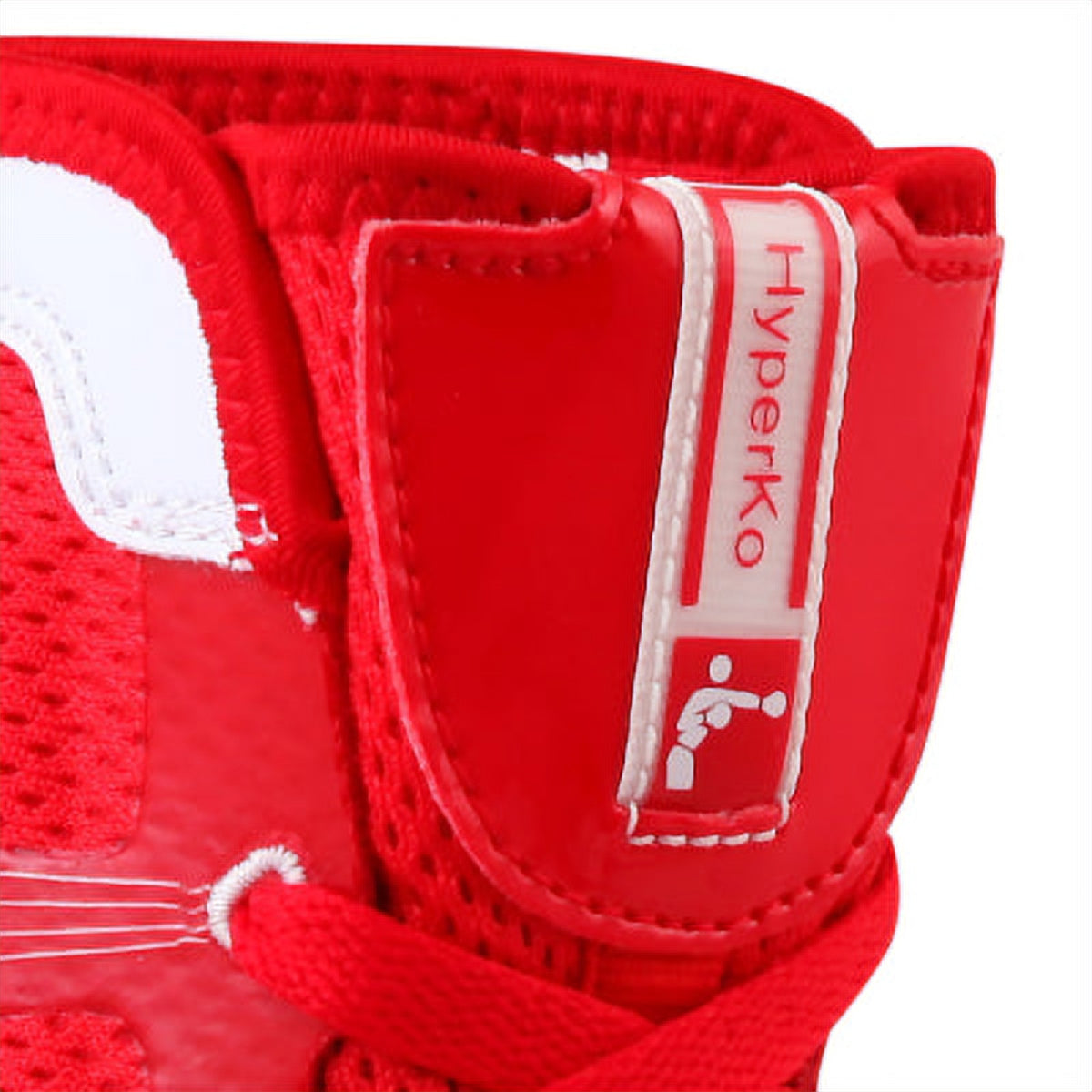 Close-up of padded tongue and inner Hyperko model badge with woven pull tab