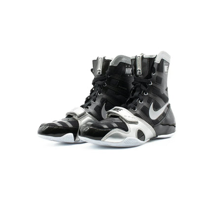 Pair of Nike Hyperko 1 boxing shoes in black and metallic silver with midfoot straps and high-top collars