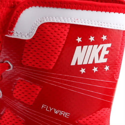 Detailed view of upper ankle collar mesh, Nike logo, and embedded red Flywire strands