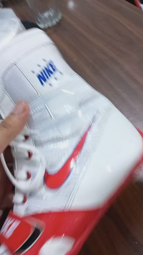 Product video of boxing shoes showing the high-top fit, lacing and outsole