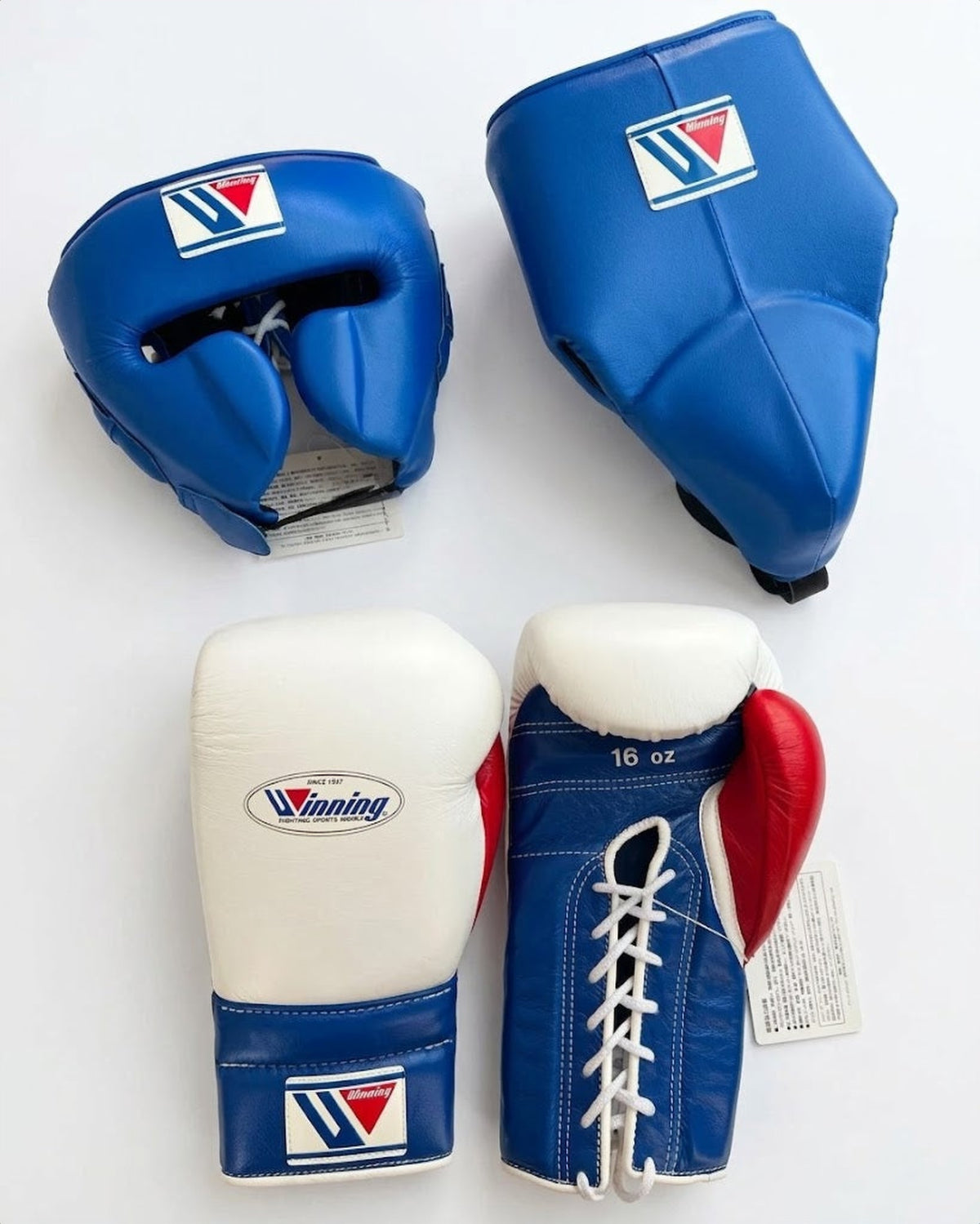 Winning Blue/White/Red 3-piece boxing sparring set with lace-up gloves, FG-2900 headgear, and CPS-500 groin guard