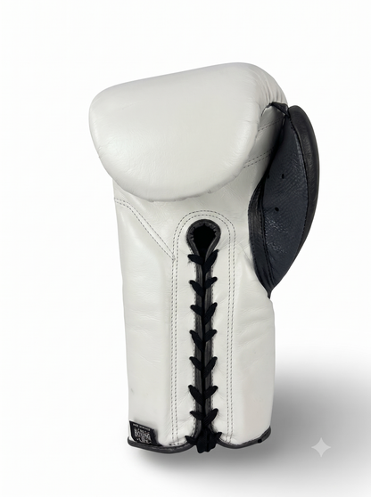 White leather sparring glove with black laces and textured impact panel